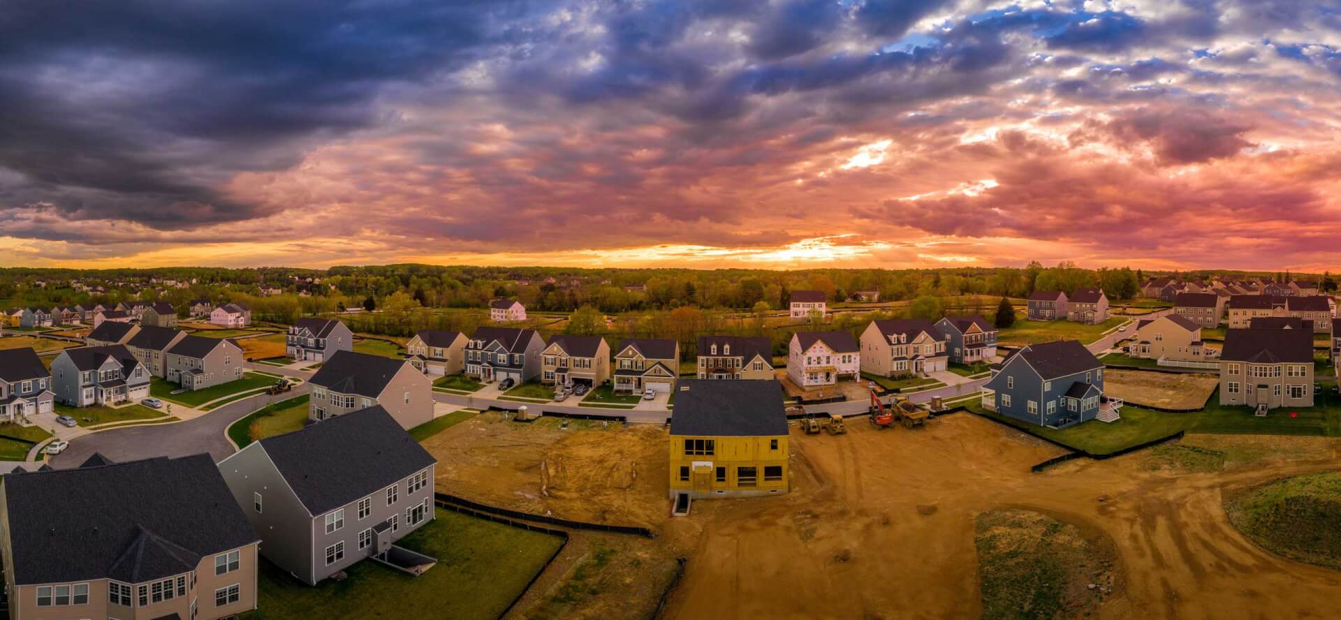 Artsy sunset over rural suburban neighborhood